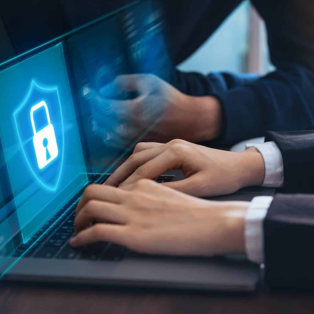Technology concept with cyber security internet and networking, Businessman hand working on laptop, screen padlock icon on digital display. Technology concept with cyber security internet and networking, Businessman hand working on laptop, screen padlock icon on digital display.