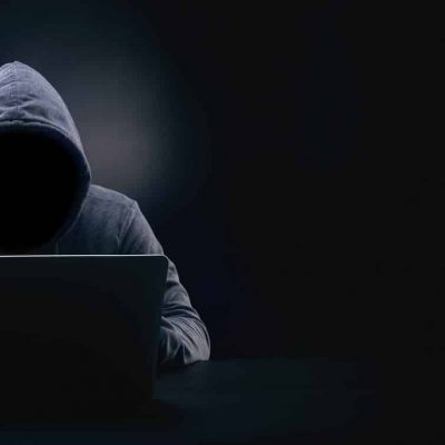 unknown hacker panoramic mockup hacker without face in a hood on a dark background, panoramic mock-up with space for text