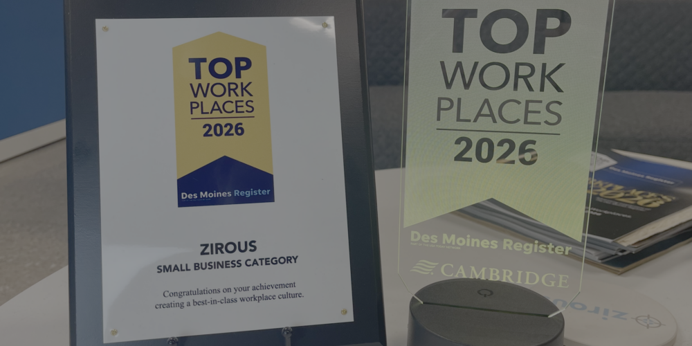 Zirous 2026 Iowa Top Workplace awards from the Des Moines Register displayed at the Zirous office.
